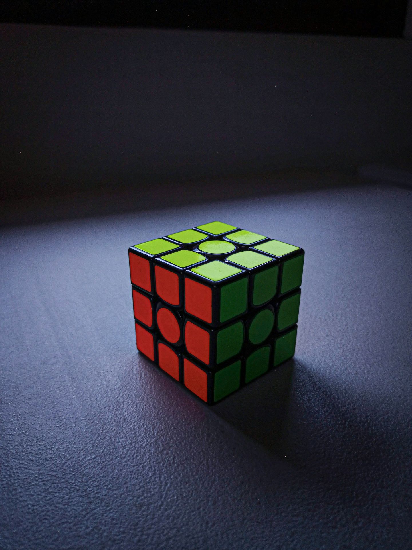 a rubik cube sitting on top of a table